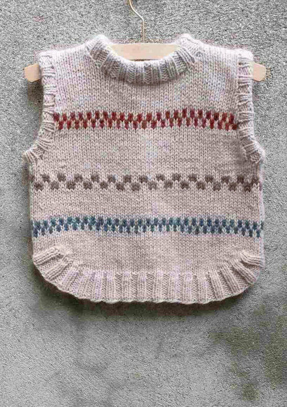 Pippi Poncho som hänger på en galge