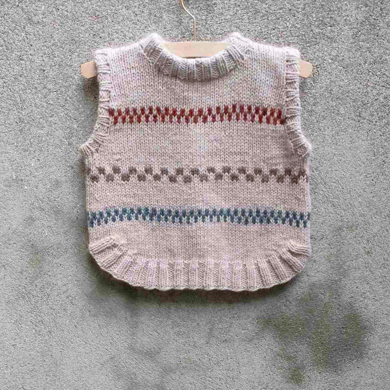 Pippi Poncho som hänger på en galge